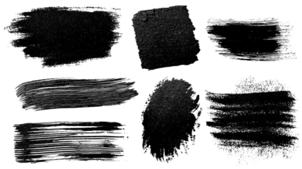A collection of black brush stroke textures showcasing various artistic styles and patterns for creative design applications.