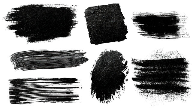 A collection of black brush stroke textures showcasing various artistic styles and patterns for creative design applications.