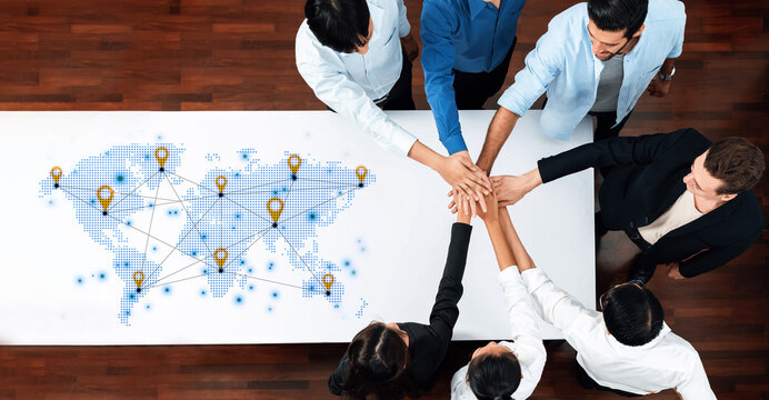 Concept of a global logistics network with location pins on a world map. This represents an international supply chain and distributed business locations for worldwide reach. Fermion