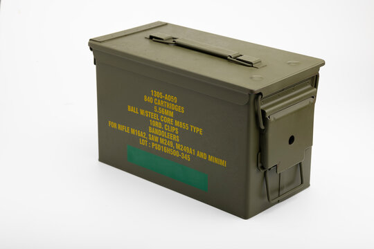 Green metal ammunition bullets box on white background