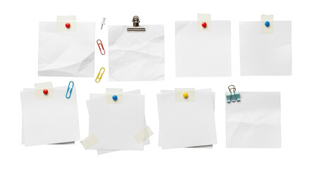 Assortment of white paper notes attached with pushpins and clips isolated on a transparent background