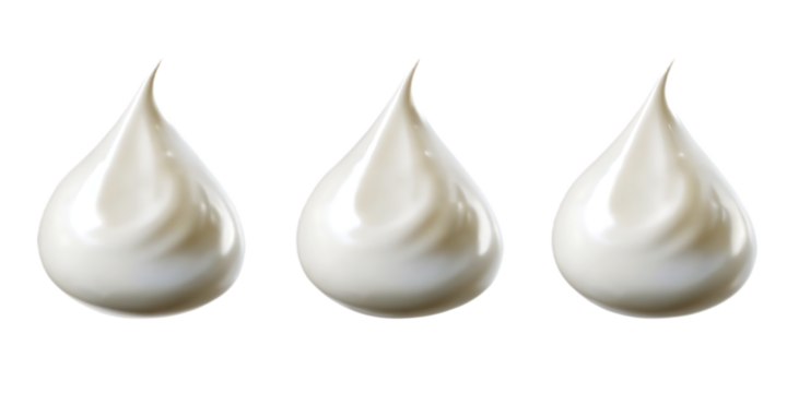 Three white cream dollops with swirling textures isolated on a transparent background