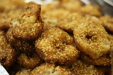 Traditional amrasa sweet made with suji semolina showing golden Pakistani dessert texture