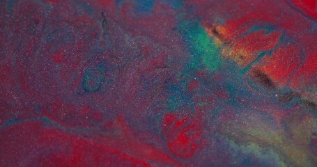 Shimmer ink. Sparkling texture. Defocused red blue purple color bright fluid pigment spreading on abstract creative blurred background. - Powered by Adobe