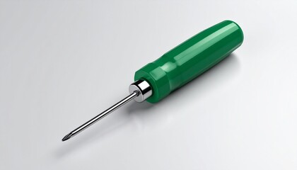 Green-handled Phillips screwdriver on dark surface