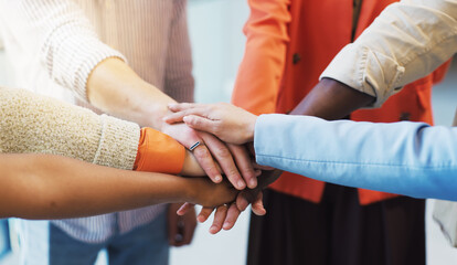 People, diversity or meeting with hands together for unity, trust or mission in office. Group, employees or multiracial team with pile, stack or huddle for community inclusion, solidarity or cohesion