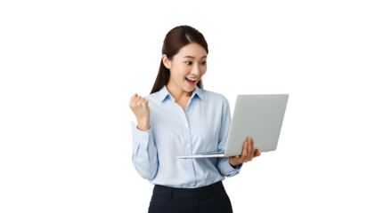 Excited young asian businesswoman celebrates online success looking at laptop screen happy millennial female entrepreneur achieving digital triumph with joyful expression and triumphant fist gesture