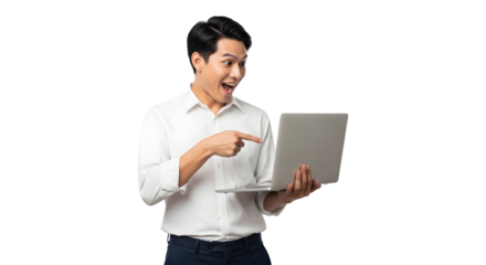 Excited young asian man in white shirt happily discovering something amazing on his laptop screen expressing great joy and surprise pointing at the display with delight