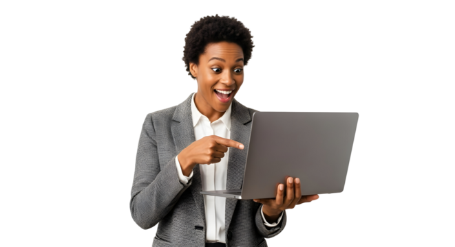 Surprised Black professional woman excitedly pointing at her laptop screen showcasing a fantastic discovery online an unexpected digital achievement or business breakthrough