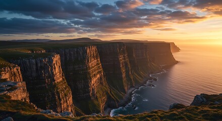 Scenic coastal cliffs at sunset with ocean and dramatic sky