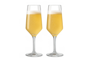 Two mimosa cocktails in elegant champagne flutes, refreshing orange juice drinks for celebrations and parties, transparent background