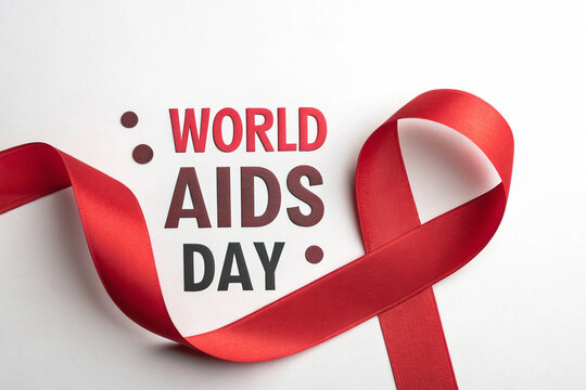 Aids awareness red ribbon isolated on white background for world aids day concept, symbol of support for people living with hiv, health and medical concept