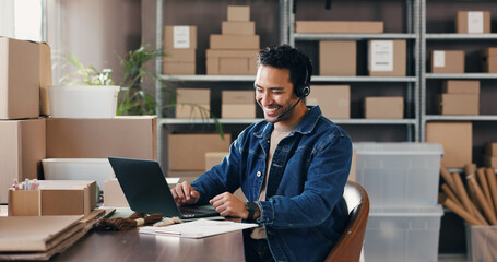 Headset, distribution and man in office with laptop for customer support, order info and shipping. Logistics, computer and happy worker with mic for small business, ecommerce feedback and help
