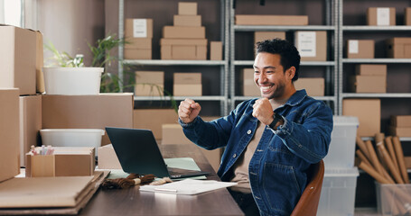 Man, fist pump and laptop with boxes for ecommerce with good news, online sales and order success....