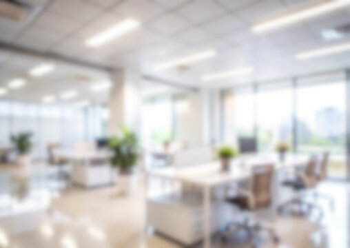 Blurred modern office background. Empty open-plan workspace with desks, chairs, and bright windows, ideal for business concept.
