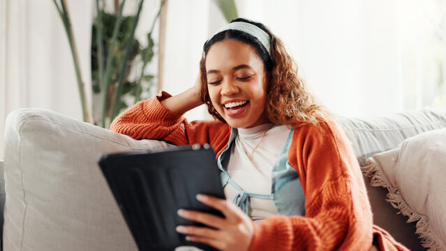 Tablet, relax and laugh with woman on sofa for social media, streaming online video and post comment. Meme, communication app and digital chat platform with person in living room of home for search
