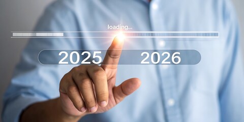 Business professional points to a futuristic digital interface displaying the years 2025 and 2026 with a progress bar indicating advancement