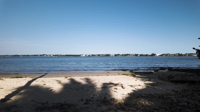 Slow right to left pan showing the Intracoastal Waterway at Summa Beach Park in West Palm Beach Florida.