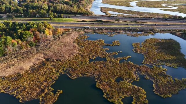 Aerial view of the Garden State Parkway cutting through Matawan Creek in Matawan, New Jersey