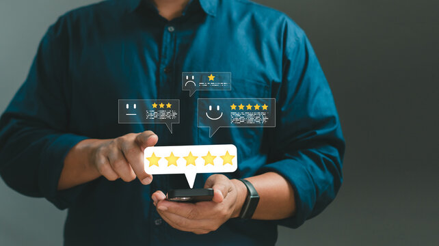 Customer review concept.person using a smartphone to submit star ratings and feedback messages, highlighting user experience, satisfaction evaluation, digital comments, and online rating systems.