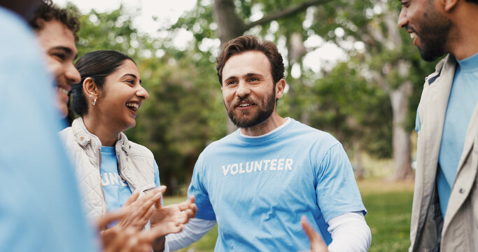 Volunteer, clapping and celebration with team outdoor for goal or conservation success. Excited people, charity group or applause for community service achievement, sustainable NGO or positive impact