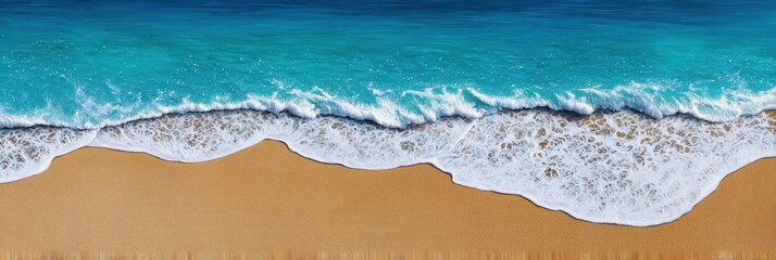 Aerial view of waves gently crashing on a sandy beach, showcasing the vibrant blue ocean and foamy white surf. Ideal for travel and nature themes.