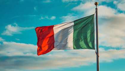 Italian Flag Waving in the Wind Against a Bright Blue Sky on a Sunny Day