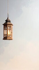 Hanging lantern glows against a soft, cloud-like background