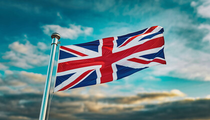 Waving Union Jack Flag Against a Dramatic Cloudy Sky