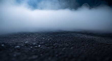 Fototapeta premium Empty dark street asphalt surface with low lying mist and blue dramatic lighting for product placement