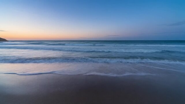 Time lapse Coastal Tranquility Serene Beach at Dawn with Gentle Waves and Soft Horizon Colors