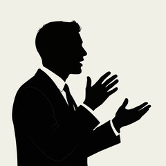 Silhouette of a businessman speaking with animated hand gestures.