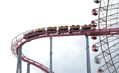 Roller Coaster Curve Near a Ferris Wheel	