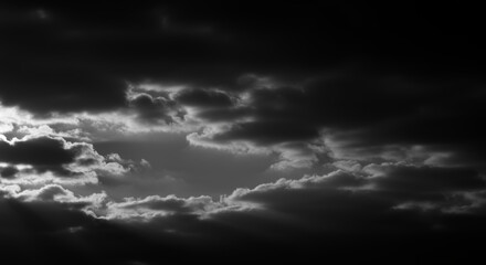 Dramatic Black and White Clouds with Ominous Sky Opening