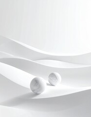 Marble spheres sit on white, layered, undulating surfaces
