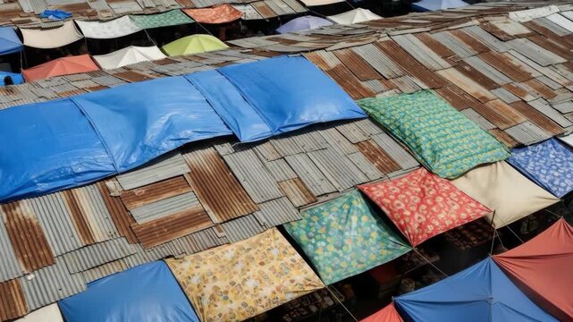Colorful rooftop canvas patterns in dynamic overhead perspective