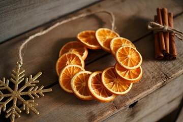 Rustic dried orange slice wreath with cinnamon sticks and snowflake ornament