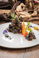 Black pepper squid ink yak cubes