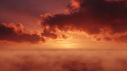 Fototapeta premium Dramatic vermillion sunset with burning horizon and atmospheric mist over calm sea