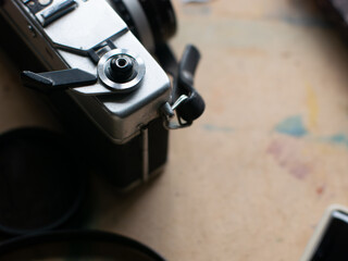 Vintage Film Camera Shutter Button and Rewind Crank Close-Up Detail on Classic Photography Equipment