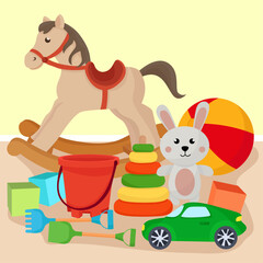 Stack of colorful vibrant toys for kids rocking horse pyramide sand toys cubes ball plush rabbit car