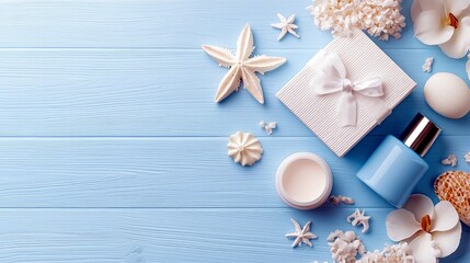 A collection of spa and beauty items, including a gift box, perfume bottle, and cream jar, are artfully arranged on a light blue wooden surface, decorated with