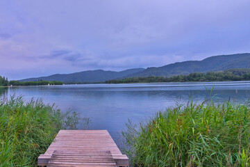 Banyoles lake serene landscape with wooden pier