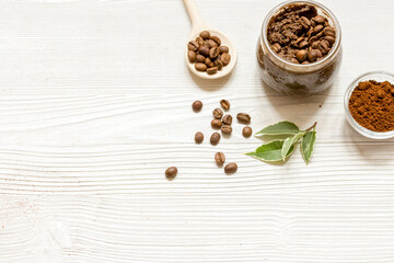 homemade coffee-sugar scrub top view wooden background