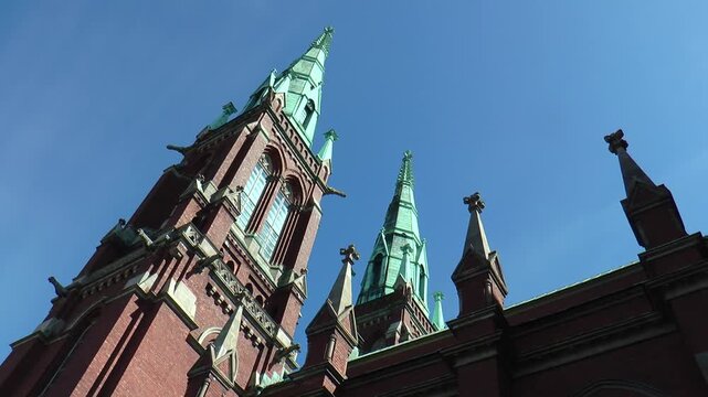 The exquisite architecture of Finland. Red brick Gothic cathedral in the center of Helsinki.