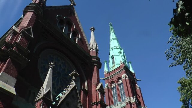 The exquisite architecture of Finland. Red brick Gothic cathedral in the center of Helsinki.
