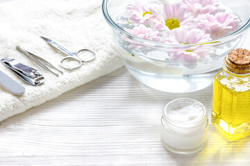 nail care and spa with essential oil on wooden background