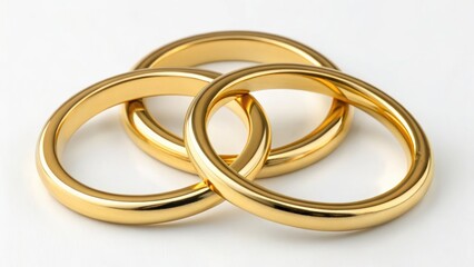 Three interlocking golden rings on a light surface, symbolizing unity and commitment.