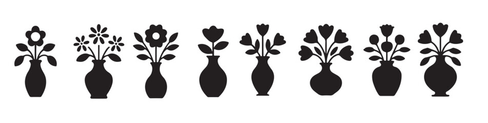 set of black and white silhouette icons of decorative flower