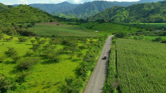 Countryside Road Through Cultivated Lands Near Presa EL Carrizo, Tamazula de Gordiano, Jalisco, Mexico. Aerial Drone Shot